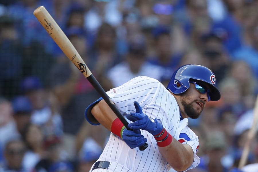 Chicago Cubs catcher and designated hitter KYLE SCHWARBER hits a single