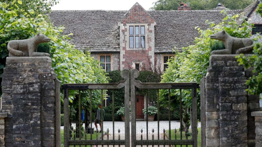 A gate protects the entrance of the Rooksnest estate near Lambourn, England, Tuesday, Aug. 6, 2019. The manor is the domain of Theresa Sackler, widow of one of Purdue Pharma’s founders and, until 2018, a member of the company’s board of directors. A complex web of companies and trusts are controlled by the family, and an examination reveals links between far-flung holdings, far removed from the opioid manufacturer’s headquarters in Stamford, Conn.