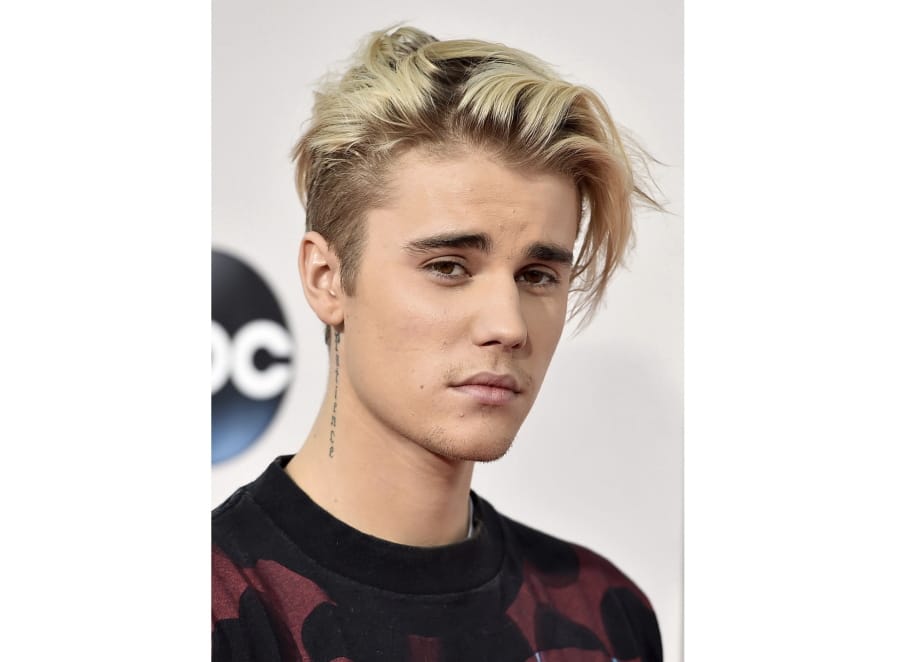 Justin Bieber arrives at the American Music Awards on Nov. 22, 2015, at the Microsoft Theater in Los Angeles.