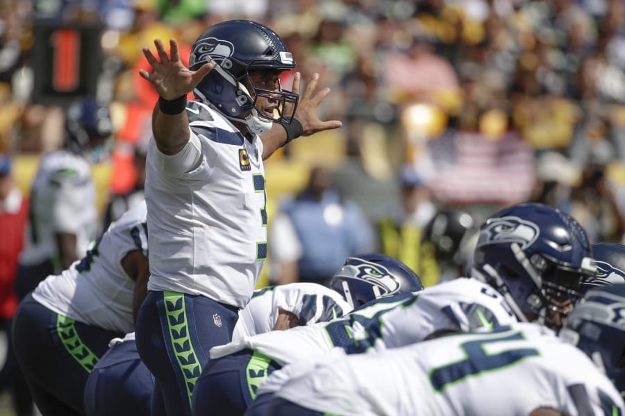 Seattle Seahawks quarterback Russell Wilson (3) calls signals against the Pittsburgh Steelers in the first half of an NFL football game, Sunday, Sept. 15, 2019, in Pittsburgh. (AP Photo/Gene J.