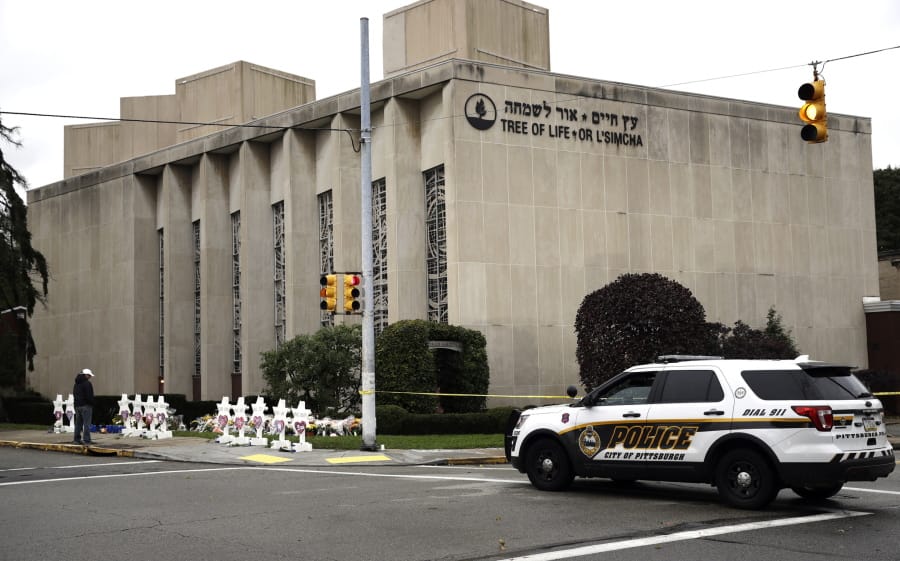 FILE - In this Oct. 29, 2018 file photo, a police vehicle is posted near the Tree of Life/Or L&#039;Simcha Synagogue in Pittsburgh. Jewish leaders are preparing to discuss plans to commemorate the deadly shooting that killed 11 worshippers inside the synagogue almost a year ago. Leaders of the three congregations whose members were attacked are gathering Friday, Sept. 20, 2019, to reflect on the past year and discuss plans for next month&#039;s observance.