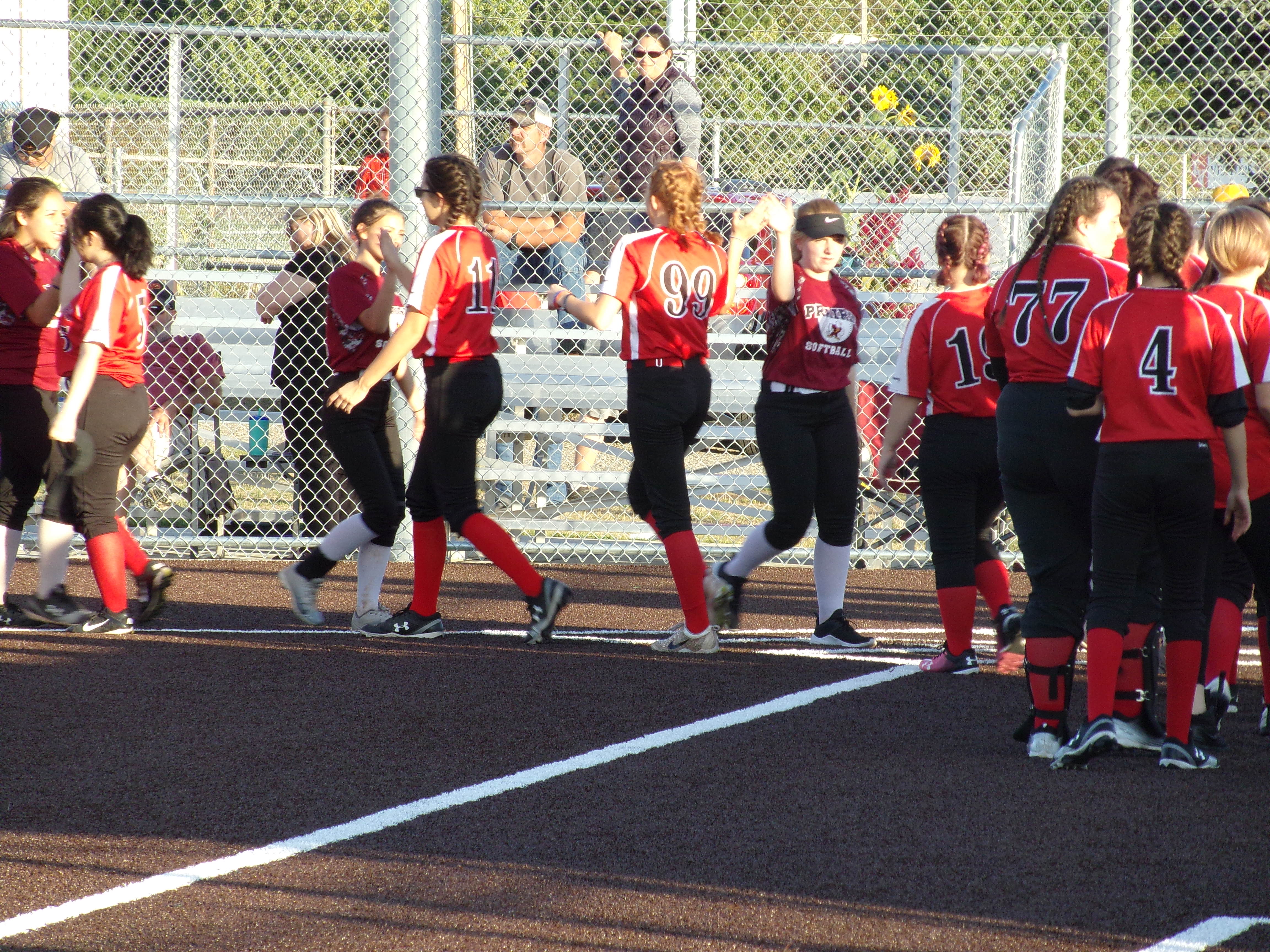 The Fort Vancouver slowpitch softball team shakes hands with Prairie after the teams' doubleheader at Fort Vancouver on Wednesday, Sept., 11, 2019 (Tim Martinez/The Columbian)