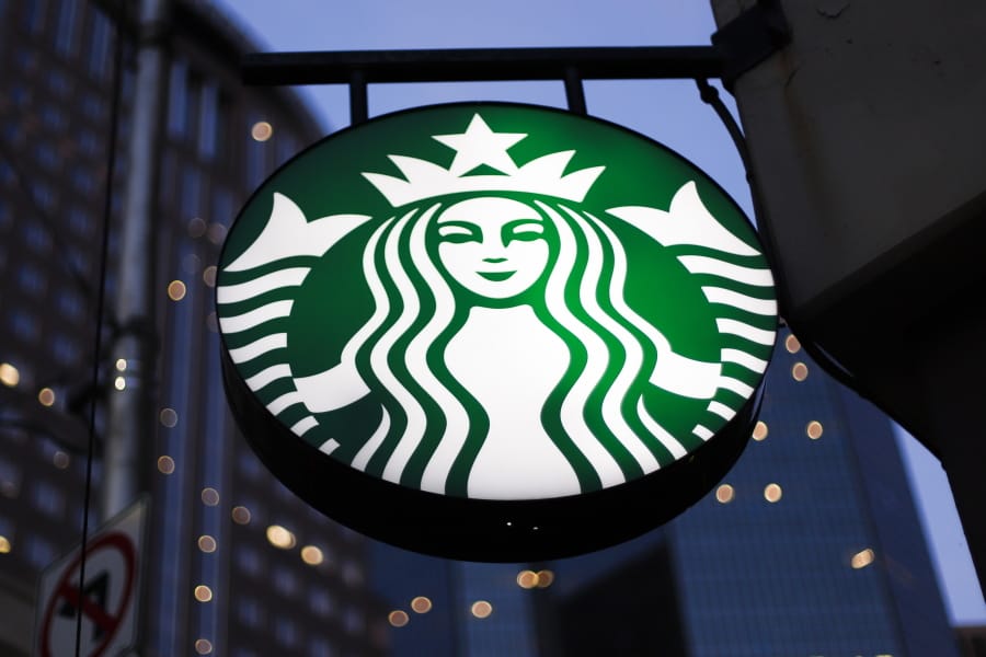 This June 26, 2019, photo shows a the Starbucks sign outside a Starbucks coffee shop in downtown Pittsburgh. (AP Photo/Gene J.