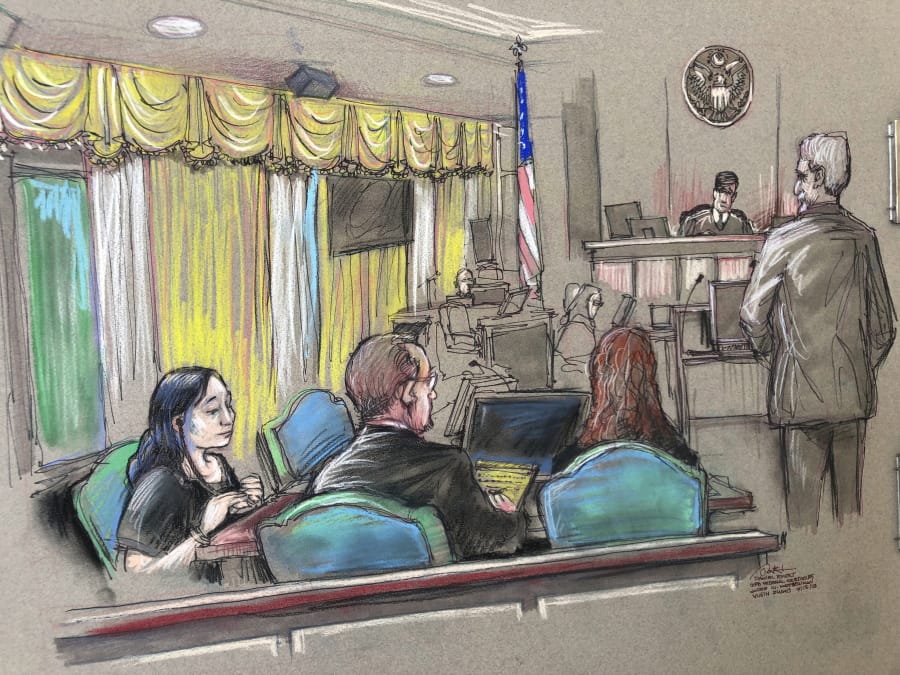 FILE - In this April 15, 2019, file court sketch, Yujing Zhang, left, a Chinese woman charged with lying to illegally enter President Donald Trump’s Mar-a-Lago club, listens to a hearing before Magistrate Judge William Matthewman in West Palm Beach, Fla. Zhang, 33, who is accused of trespassing at Trump’s Mar-a-Lago club and lying to Secret Service agents will be tried by a jury after frustrating the federal judge hearing her case.