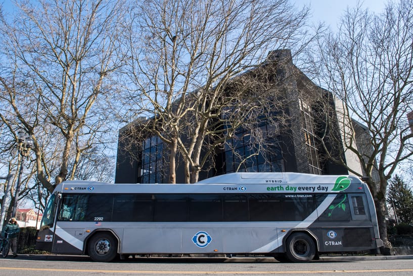 A C-Tran bus is seen here in front of the Vancouver Community Library in February.  A woman has sued C-Tran after she says she suffered head injuries when a C-Tran bus crashed into a bus shelter in downtown Vancouver in 2016.