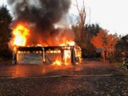 Clark County Fire & Rescue crews extinguished a garage fire Tuesday morning in Battle Ground. The fire was threatening a nearby home, which was not damaged.
