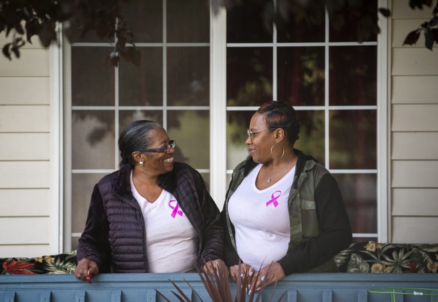 Della Frazier, left, and her daughter Zsaneen Kennedy, both of Vancouver, are pictured together Sept. 16 at Frazier&#039;s home. The mother and daughter were diagnosed with breast cancer in 2018. Both are now cancer-free.