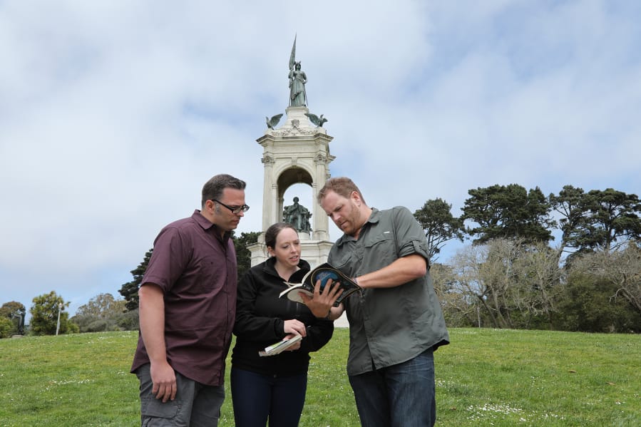 Dustin and Diedra White of Vancouver, from left, consult with &quot;Expedition Unknown&quot; host Josh Gates during the Oct.