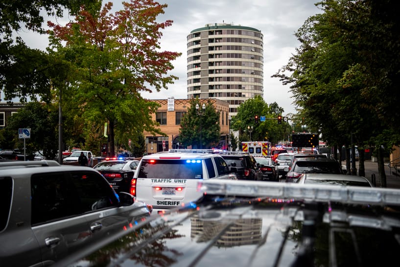 Local law enforcement vehicles line up along Washington St. in downtown Vancouver as they work an active shooter situation at Smith Tower on Thursday afternoon, Oct. 3, 2019.