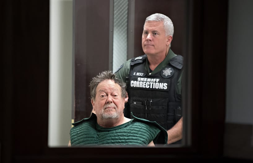 Robert Breck, 80, the suspect in an Oct. 3 fatal shooting at Smith Tower, is wheeled out of the courtroom after making a first appearance in Clark County Superior Court on Friday morning, Oct. 4, 2019.