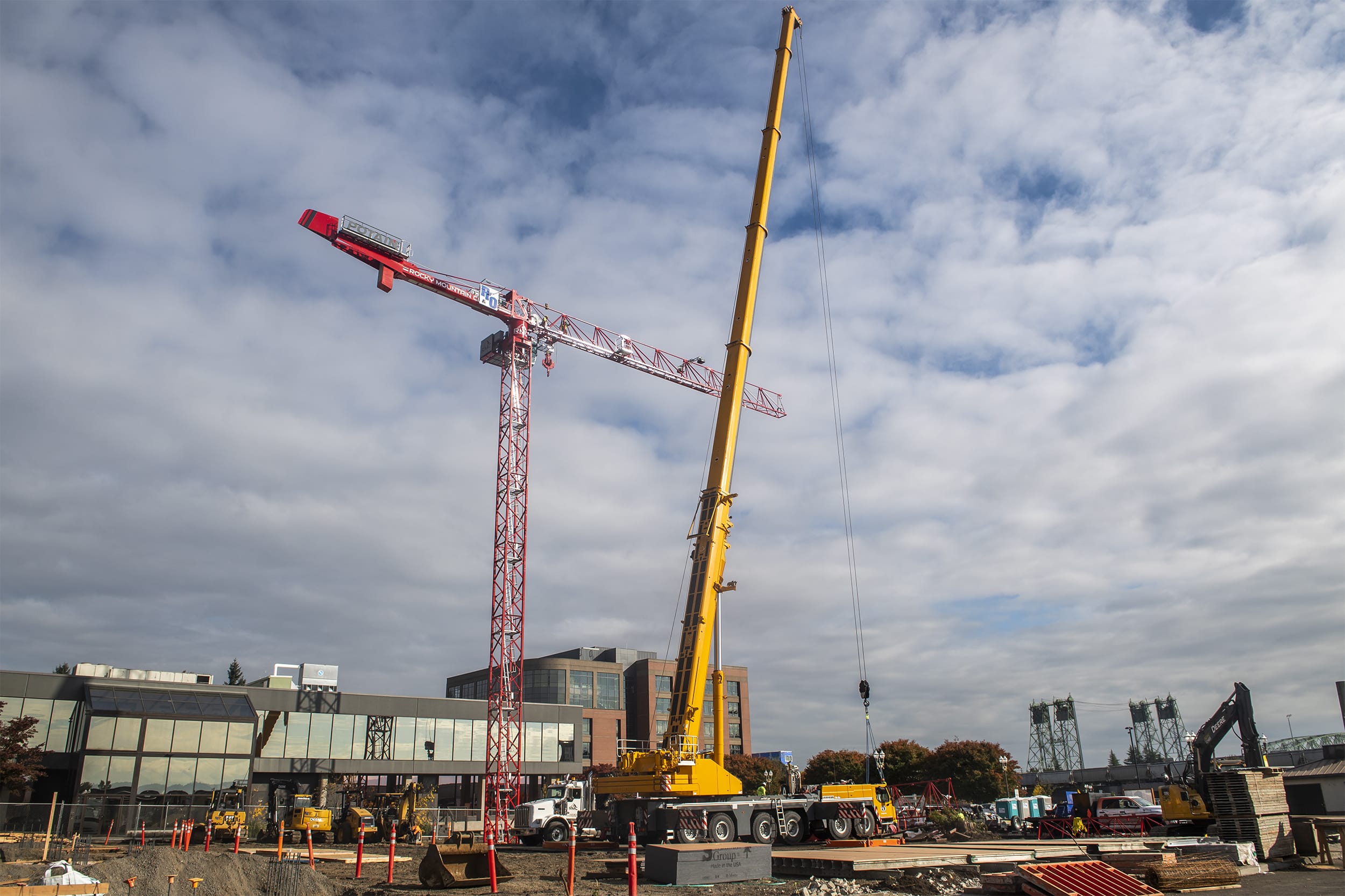Crews work to assemble a tower crane in downtown Vancouver at the future site of the Aria Apartments on Monday afternoon, Oct. 7, 2019.