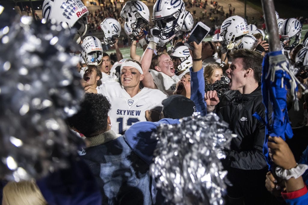 Skyview celebrates their 30-3 victory over Union after a game at McKenzie Stadium on Friday night, Oct. 11, 2019.