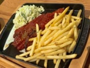 Slow-roasted beef short rib, pickled slaw and Parmesan Truffle Herb Fries at Barlow's Public House.