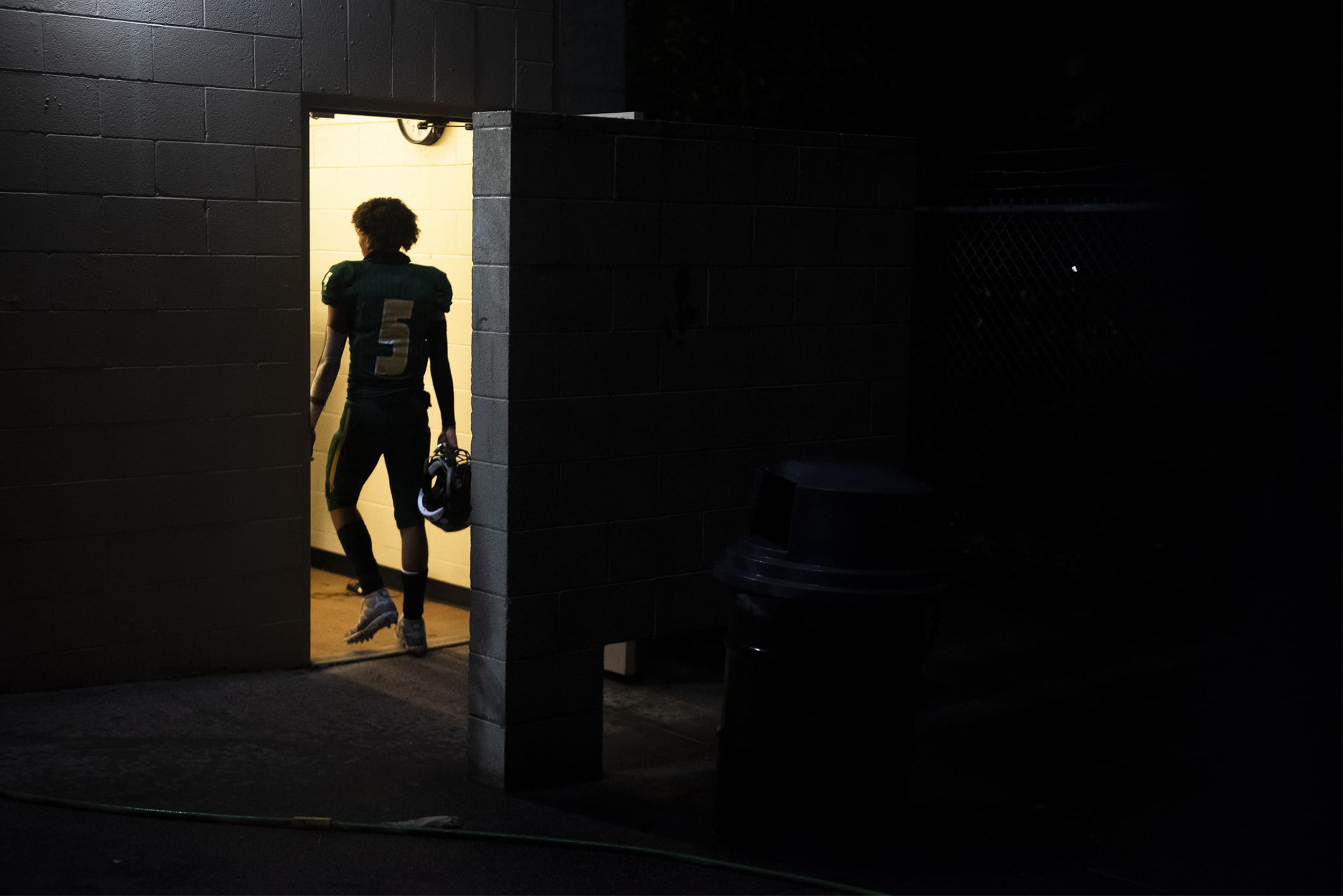 Evergreen’s  Jaylen Fite walks into the locker room at half time during a game against Mountain View at McKenzie Stadium on Friday night, Oct. 18, 2019.