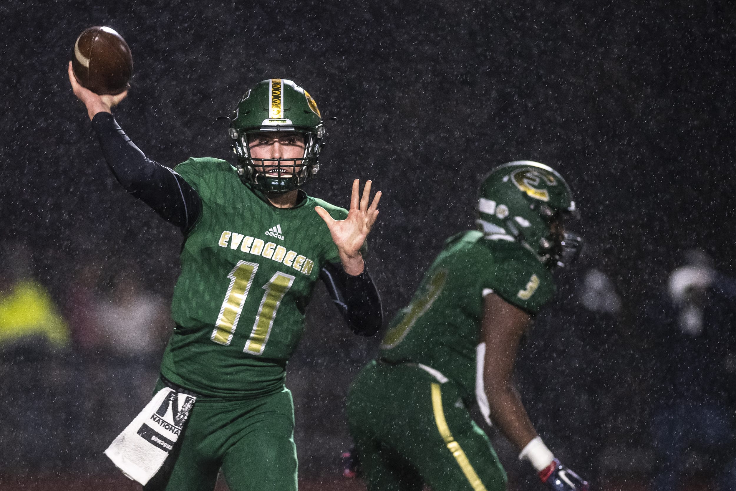 Evergreen’s Carter Monda throws the ball against Mountain View during a game at McKenzie Stadium on Friday night, Oct. 18, 2019.