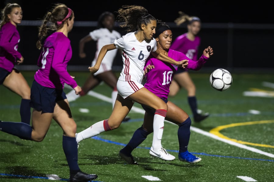 UnionCfUs Maya Woods and SkyviewCfUs Olivia Calton battle for the ball as Woods drives into Skyview territory during a game at Skyview High School on Tuesday night, Oct. 22, 2019.