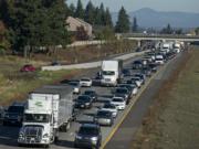 Morning traffic crawls along Interstate 205 South near the exit for Mill Plain Boulevard.