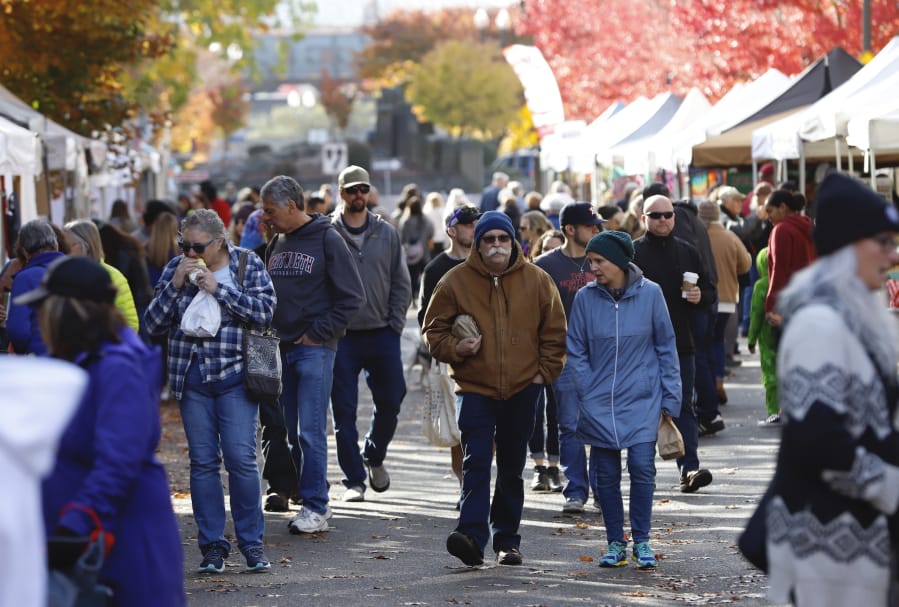 Shoppers stroll up Esther Street on the last weekend of the Vancouver Farmers Market on Saturday. The market saw its highest yearly attendance in 2019, when an estimated 420,000 shoppers attended.