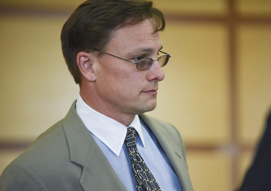 Former Evergreen High School teacher Matthew Morasch enters the courtroom at the Clark County Courthouse before a Clark County Superior Court jury on Wednesday, July 19, 2017, found him guilty of voyeurism. Morasch took "upskirt" video with his cellphone of an unidentified female in the Battle Ground Goodwill and tried to take images of two female students in his class.