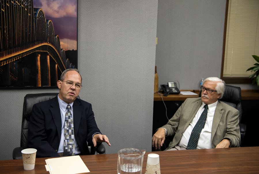 Port of Vancouver commissioner candidates Jack Burkman, left, and Dan Barnes speak with The Columbian's Editorial Board on Sept. 26.