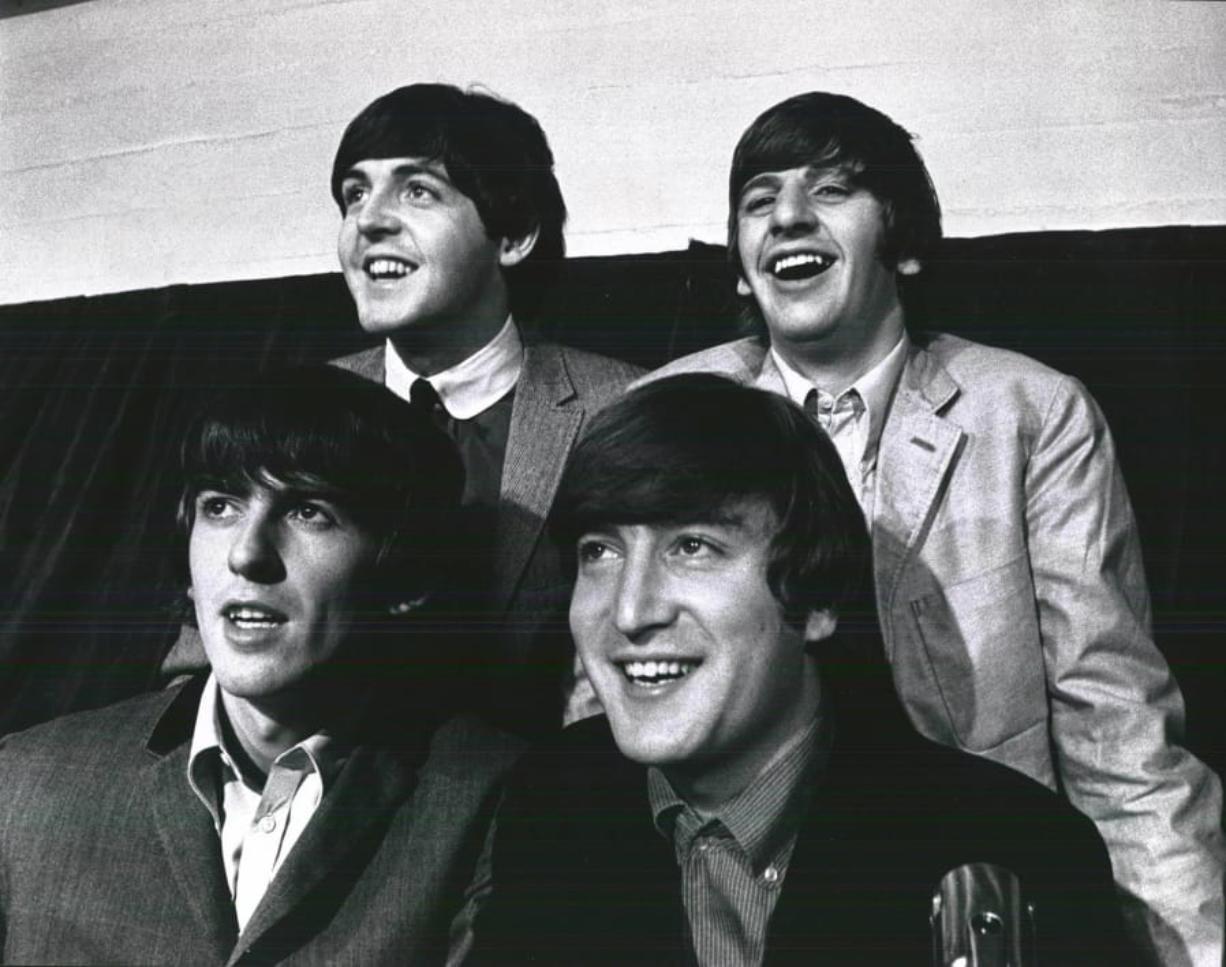 The Beatles amid a September 1964 tour apperance in Detroit.