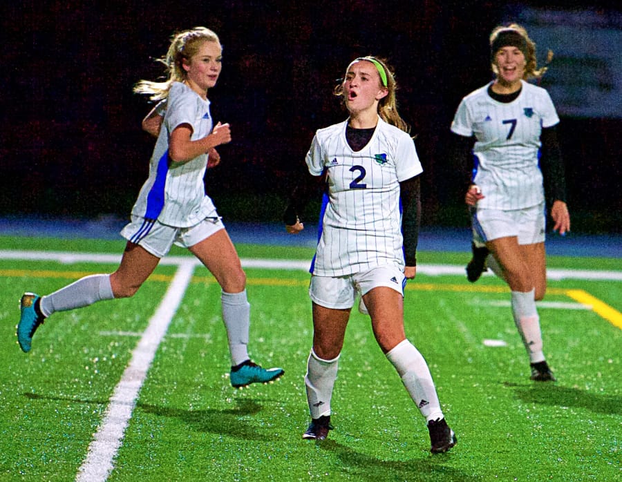 Mountian View&#039;s Kylie Ellett celebrates her goal in the first half of Tuesday&#039;s match against Kelso. Mountain View won 2-1 in overtime to wrap up the 3A Greater St. Helens League title.