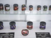 Marijuana packaged in glass jars is on display July 15 at a state-licensed recreational cannabis retail shop.