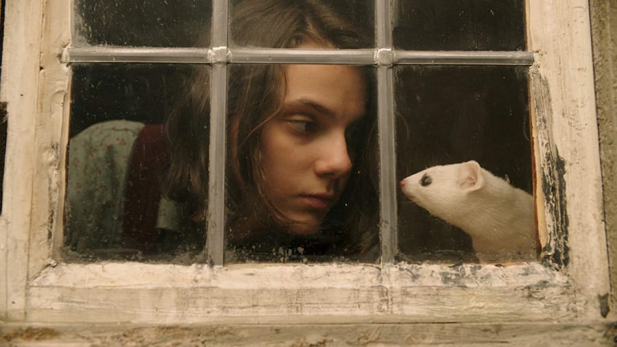 Lyra Belacqua, played by Dafne Keen, shares a moment with her daemon, Pan, voiced by Kit Connor, in HBO&#039;s adaptation of Philip Pullman&#039;s &quot;His Dark Materials.&quot; (HBO)