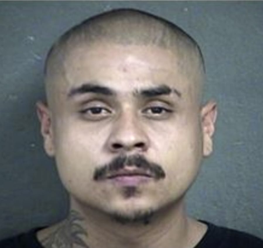 This undated photo provided by the Kansas City Kansas Police Department shows Hugo Villanueva-Morales. Villanueva-Morales, one of the two men accused of opening fire inside a Kansas bar early Sunday, Oct. 6, 2019, remains at large, while the other man Javier Alatorre, was arrested Sunday afternoon, police said. Villanueva-Morales and Alatorre were each charged with four counts of first-degree murder, police in Kansas City, Kansas, said in an early Monday, Oct. 7 release.