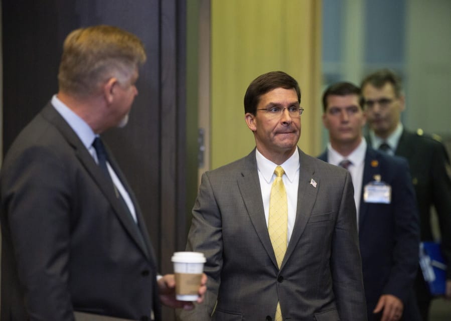 U.S. Secretary for Defense Mark Esper, center, arrives for a meeting of NATO defense ministers at NATO headquarters in Brussels, Friday, Oct. 25, 2019. NATO defense ministers on Friday are scheduled to discuss efforts to deter Russia in eastern Europe and the future of the mission training security forces in Afghanistan.