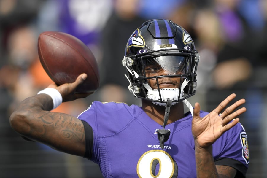 Baltimore Ravens quarterback Lamar Jackson works out prior to an NFL football game against the Cincinnati Bengals Sunday, Oct. 13, 2019, in Baltimore.