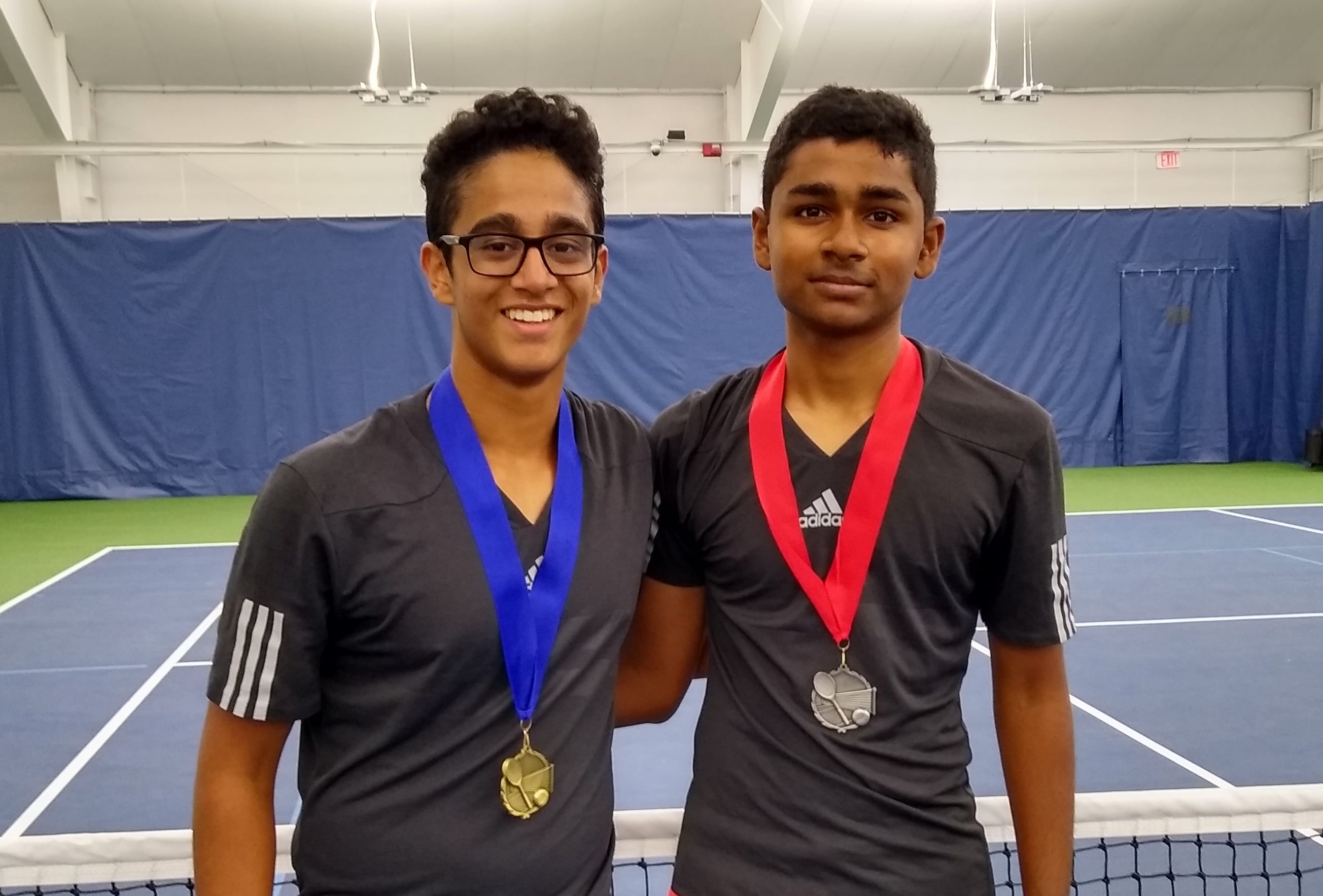 2019 4A district boys singles tennis champion Akash Prasad (left) and runner-up Shiva Narayanan, both from Camas.