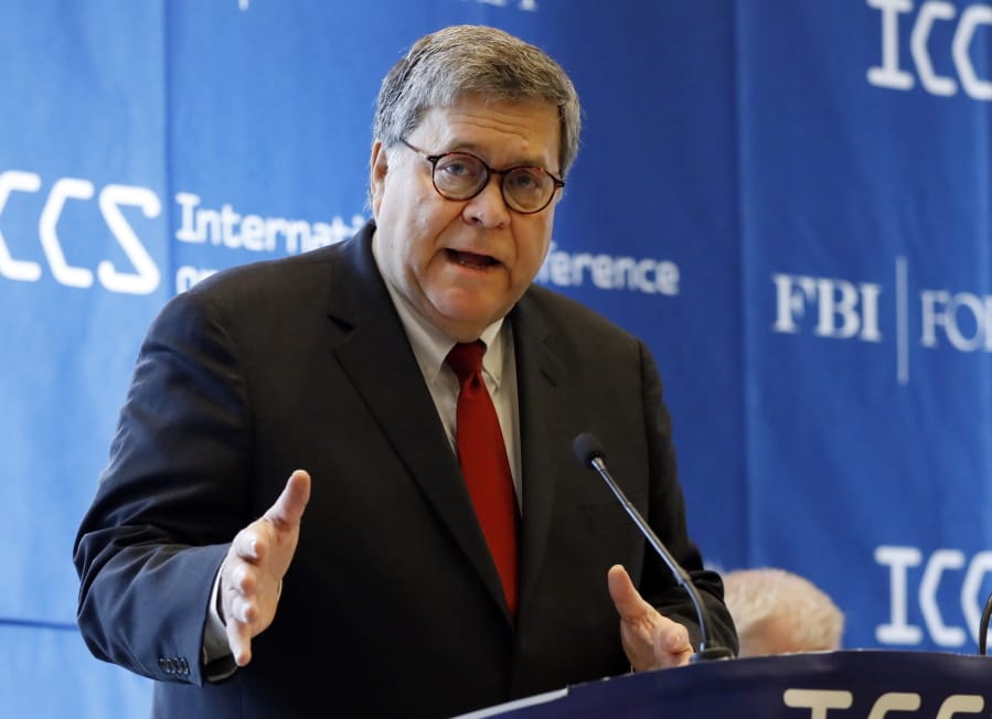 FILE - In this July 23, 2019 file photo U.S. Attorney General William Barr addresses the International Conference on Cyber Security at Fordham University in New York. Attorney General William Barr wants Facebook to give law enforcement a way to read encrypted messages sent by users, re-igniting tensions between tech companies and law enforcement.