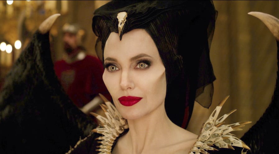 This image released by Disney shows Angelina Jolie as Maleficent in a scene from &quot;Maleficent: Mistress of Evil.&quot; (Disney via AP) (Jaap Buitendijk/Disney)