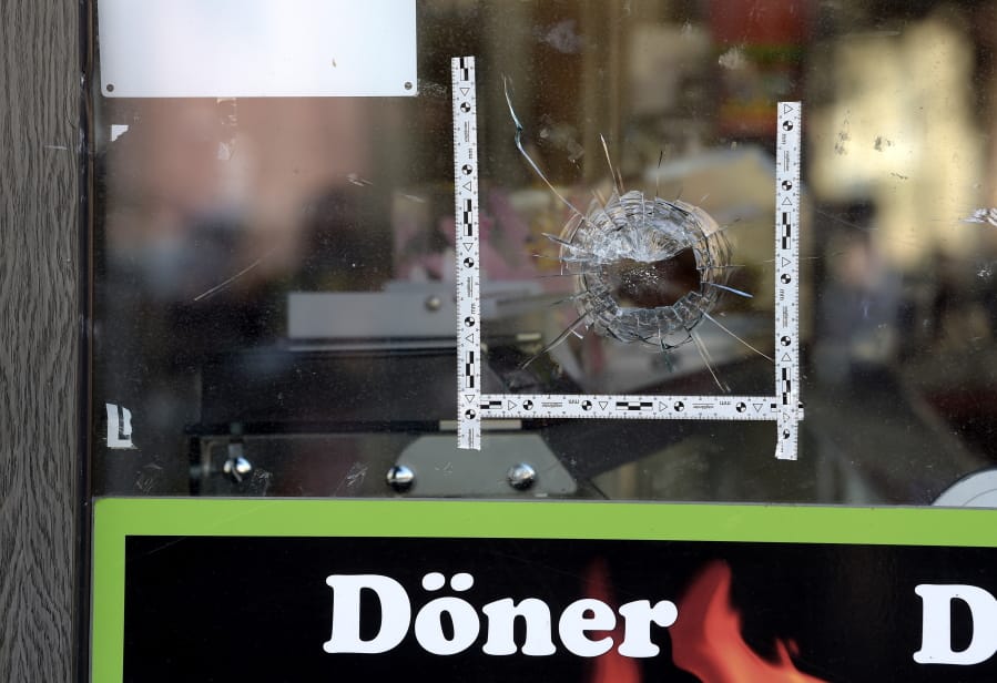A bullet hole is seen in a window of a kebab grill in Halle, Germany, Thursday, Oct. 10, 2019. A heavily armed assailant ranting about Jews tried to force his way into a synagogue in Germany on Yom Kippur, Judaism&#039;s holiest day, then shot two people to death nearby in an attack Wednesday that was livestreamed on a popular gaming site.