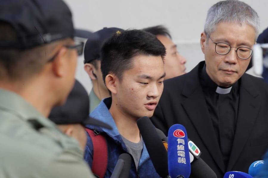 Chan Tong-kai, center, talks to the media as he is released from prison in Hong Kong Wednesday, Oct. 23, 2019. Chan, who&#039;s wanted for killing his girlfriend last year on the self-ruled island, had asked the Hong Kong government for help turning himself in to Taiwan after his sentence for money laundering offenses ends on Wednesday.