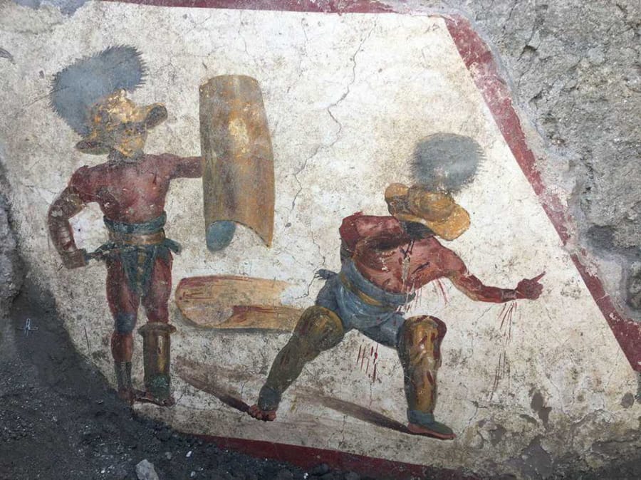 A view of a well-preserved fresco depicting fighting gladiators in the ancient Roman city of Pompeii, Italy, recently unearthed by archeologists.