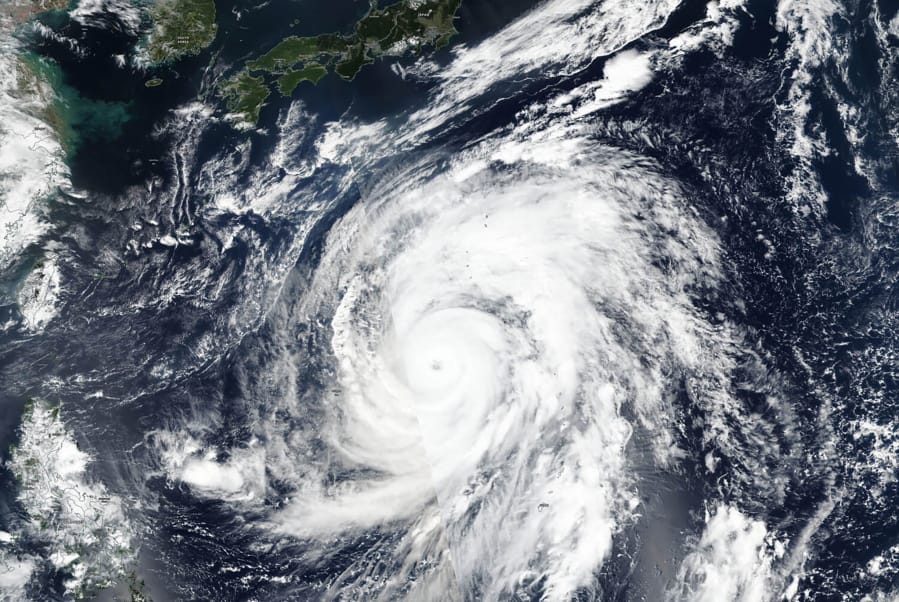 This Oct. 9, 2019, satellite photo taken by NASA-NOAA&#039;s Suomi NPP satellite shows typhoon Hagibis approaching Japan, top.  Japan&#039;s weather agency is warning a powerful typhoon may bring torrential rains to central Japan over the weekend. Typhoon Hagibis had winds gusting up to 270 kilometers per hour (168 mph) Thursday morning.