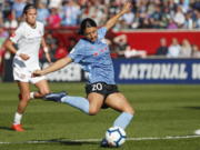 Chicago Red Stars forward Sam Kerr scores against the Portland Thorns FC during the first half of an NWSL playoffs semi-final soccer match Sunday, Oct. 20, 2019, in Bridgeview, Ill.