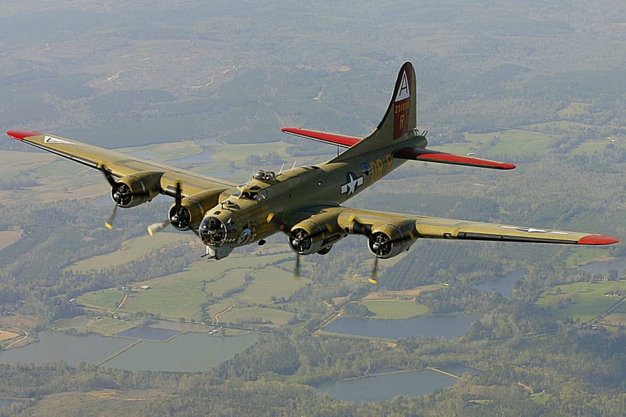 FILE - In this April 2, 2002, file photo, the Nine-O-Nine, a Collings Foundation B-17 Flying Fortress, flies over Thomasville, Ala., during its journey from Decatur, Ala., to Mobile, Ala. A B-17 vintage World War II-era bomber plane crashed Wednesday, Oct. 2, 2019,  just outside New England&#039;s second-busiest airport, and a fire-and-rescue operation was underway, official said. Airport officials said the plane was associated with the Collings Foundation, an educational group that brought its &quot;Wings of Freedom&quot; vintage aircraft display to Bradley International Airport this week.