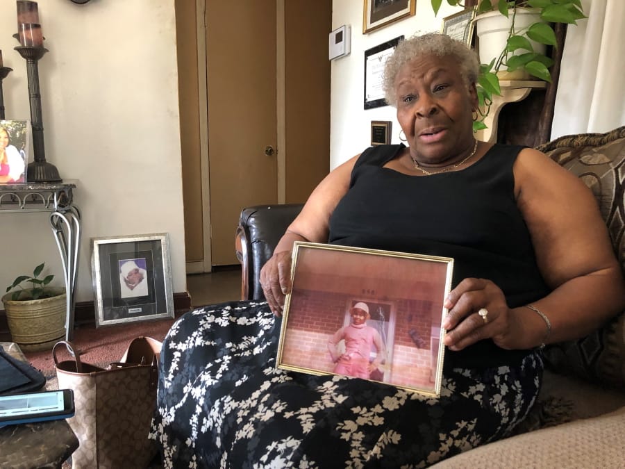 Minnie Hill holds a photo of her late daughter, Rosie Hill, as she speaks to a reporter in her home on Thursday, Oct. 10, 2019 in Memphis, Tenn. Rosie Hill was found dead in Florida in 1982. In 2018, after Texas authorities began tying Samuel Little to murders around the country, Marion County, Fla., Sheriff&#039;s Detective Sgt. Michael Mongeluzzo joined police from several states who flew to a Texas prison, where Little was temporarily being held, in efforts to bring closure for their cold cases. The sheriff&#039;s office said &quot;Little confessed to killing Rosie Hill and dumping her body,&quot; and even &quot;told Sgt.