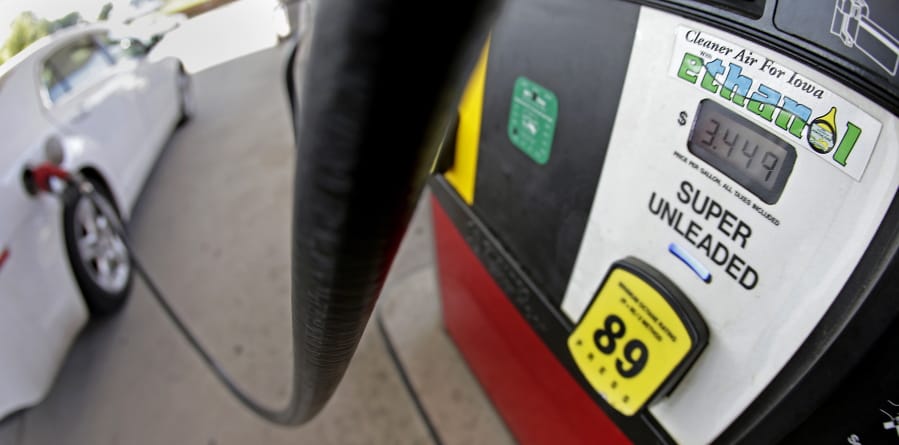 A motorist fills up with gasoline containing ethanol on July 26, 2013, in Des Moines. The Trump administration says it plans to implement new rules that will increase demand for ethanol, reversing a decline caused by exemptions given to oil refineries.