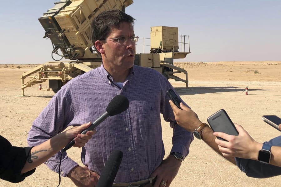 Defense Secretary Mark Esper talks to reporters at Prince Sultan Air Base in Saudi Arabia, Tuesday, Oct. 22, 2019, where he saw a Patriot missile battery that the US sent to Saudi to help protect the kingdom against the Iranian threat.