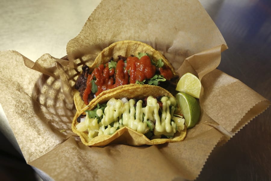 Fresh tacos served up at the Mi Vegana Madre restaurant offering Mexican vegan food in Glendale, Ariz. No longer just a few items on a mainstream restaurant&#039;s menu, vegan Mexican food has become a widening industry on its own with Latinos taking control of the kitchen. (AP Photo/Ross D. Franklin) (Ross D.