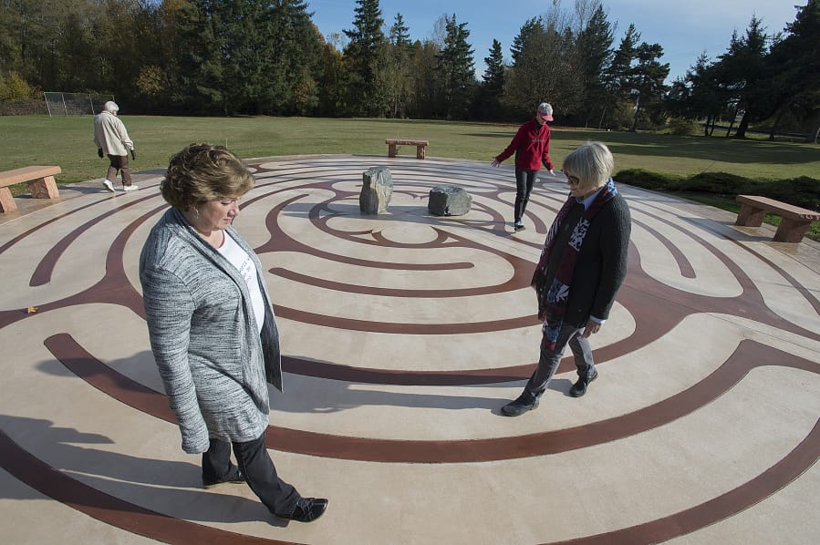 Fae Jackson, left, and Penny Hammac first hatched the idea of building a labyrinth on the grounds of the Southridge Community of Christ church near the Clark County Fairgrounds. &quot;It&#039;s a beautiful, peaceful experience,&quot; said Hammac. &quot;It&#039;s a form of prayer or meditation, except you get to move.