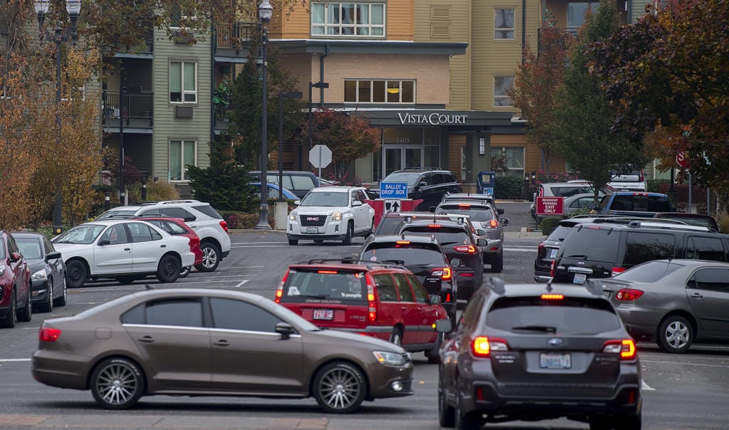 Traffic backs up on West 14th Street as voters drop off ballots in downtown Vancouver on Election Day.