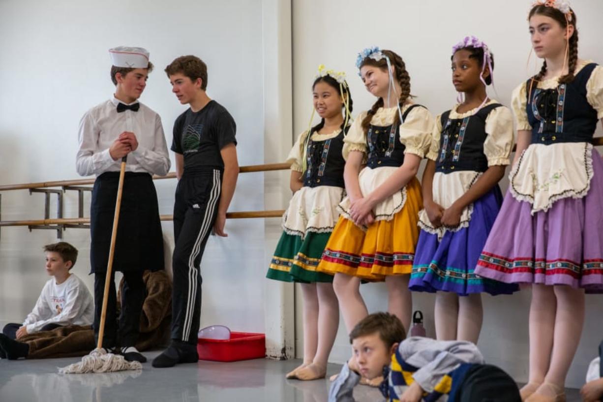 Joey, left, and Tyler Stanley consult during a recent dress rehearsal for &quot;Petrushka&quot; at The Portland Ballet studio.
