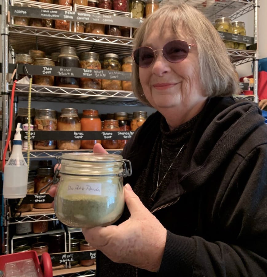 Judith Seifert of Battle Ground in her pantry of food she has preserved.