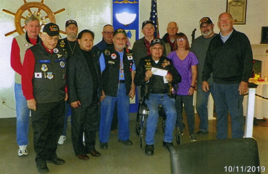 Esther Short: Members of the Labor Roundtable of Southwest Washington present a check to the Clark County chapter of the National Korean War Veterans Association Inc., the Richard L.