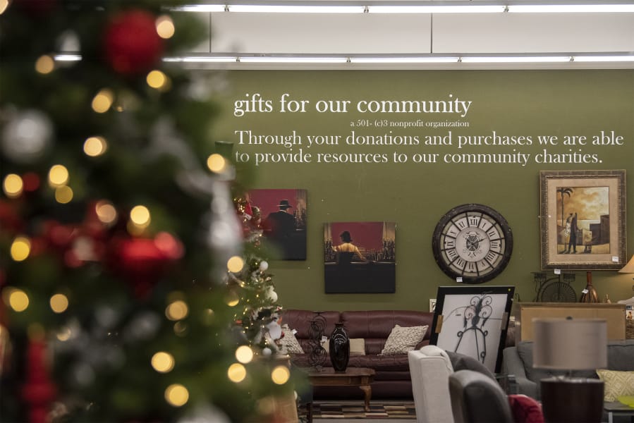 Vancouver&#039;s Divine Consign &quot;gifts for our community&quot; motto is seen here with Christmas trees that will be raffled at the store during the holidays.